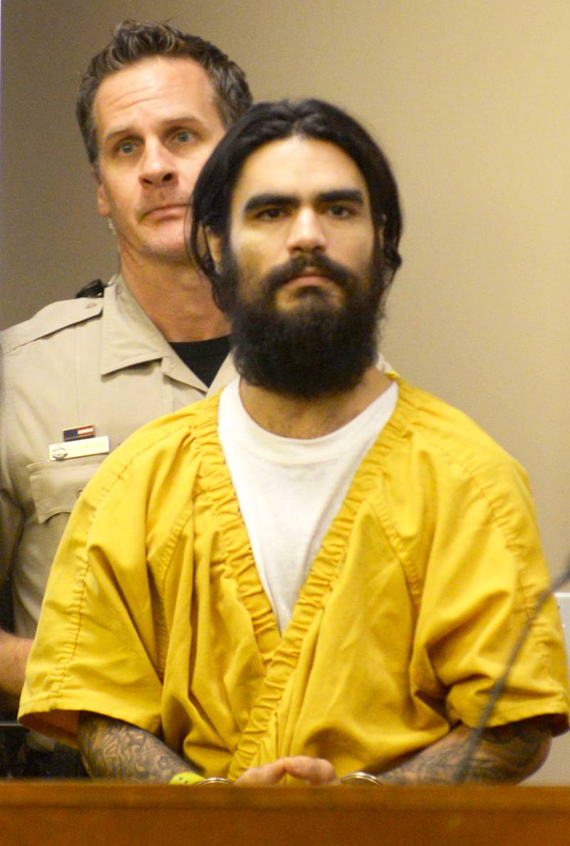 Johnathon Gounaris is escorted into a courtroom by Deputy Dan Daub for a  preliminary hearing at the Ogle County Judicial Center in Oregon on Wednesday, July 10, 2024. He is charged with attempted murder following a June 12 incident at a Lost Lake home in rural Dixon where three police officers were shot.