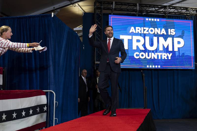 Republican vice presidential candidate Sen. JD Vance, R-Ohio, waves to the crowd as he walks toward the podium during a campaign event in Glendale, Ariz., Wednesday, July 31, 2024. (AP Photo/Jae C. Hong)
