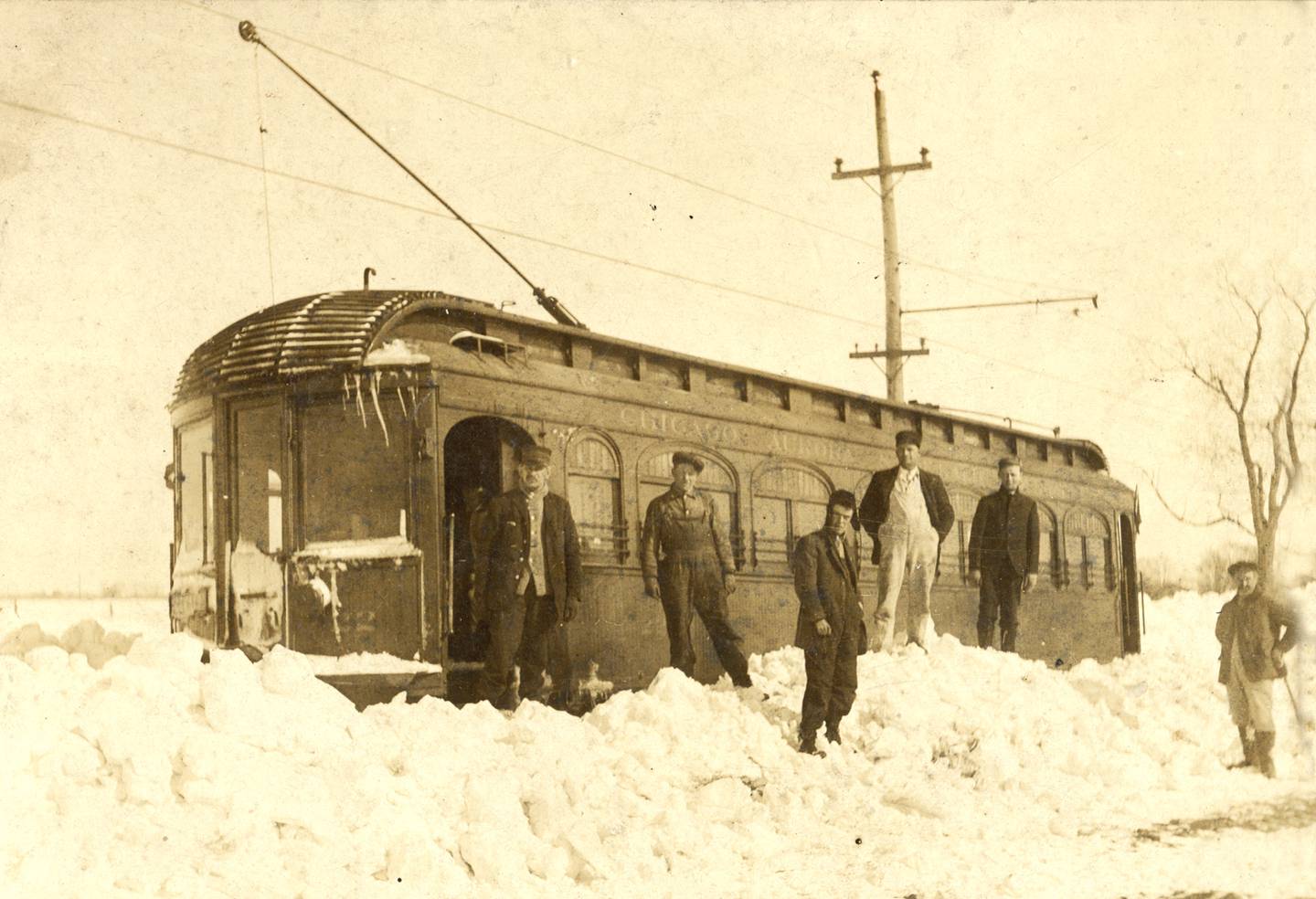 A heavy snow blanketed the tracks and slowed passage in the winter of 1917-1918 for this Fox & Illinois Union trolley near Oswego. (Photo provided by the Little White School Museum)