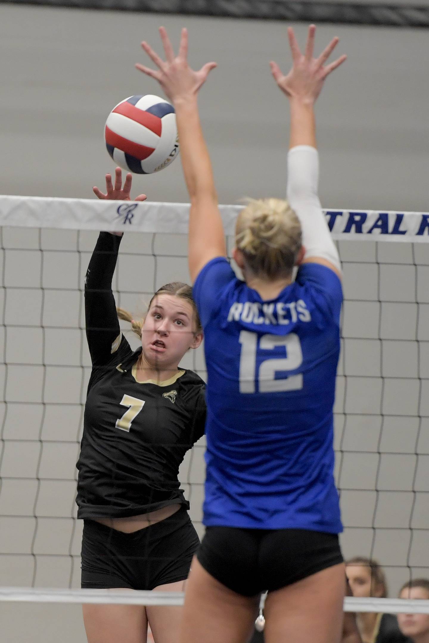 Sycamore's Laci Neece (7) hits the ball past Central's Leah Freesemann (12) during the Class 3A Burlington Central Girls Volleyball Regional on Thursday, Oct. 26, 2023.