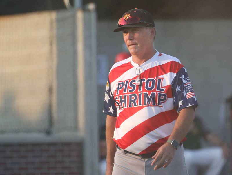 John Jakiemiec team owner and field manager walks out to the mound during the Illinois Valley Pistol Shrimp baseball game at Schweickert Stadium on Tuesday, June 20, 2023 in Peru.