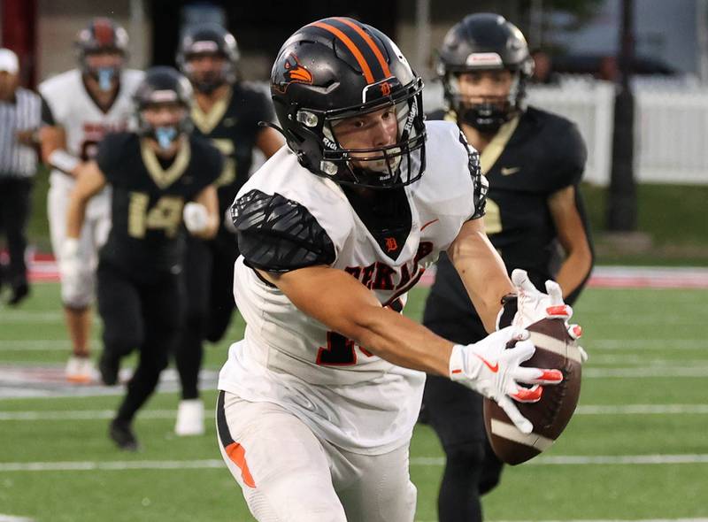 DeKalb's Jack Rosenow gets behind the Sycamore defense for a reception on a trick play Friday, Aug. 29, 2025, during the FNBO Challenge in Huskie Stadium at Northern Illinois University.