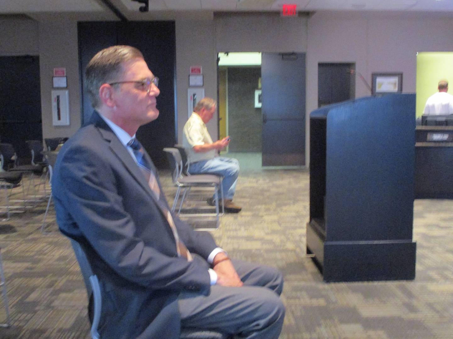 Rod Tonelli awaits the start of a special meeting Friday of the Joliet City Council, which voted 7-2 to hire him as interim city manager. June 9, 2023.