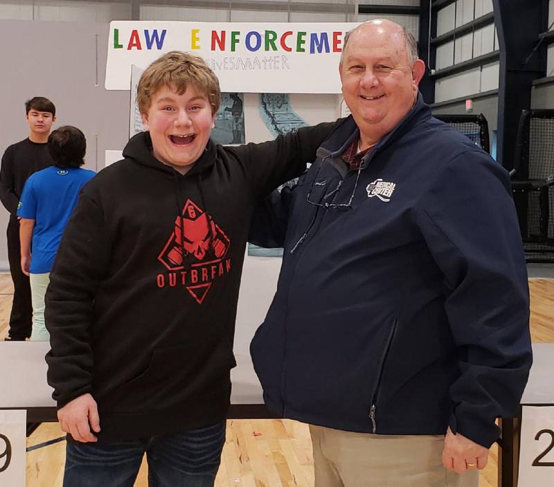 Blayn Riley, now a senior at Sterling High School, stands with retired teacher and Sterling Mayor Skip Lee. They have been paired in the Mentor Project since 2013.