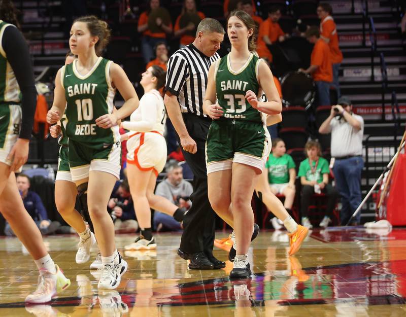 St. Bede players Grace Millington and Ella Engehaupt run onto the court during the Class 1A third-place game on Thursday, Feb. 29, 2024 at CEFCU Arena in Normal.