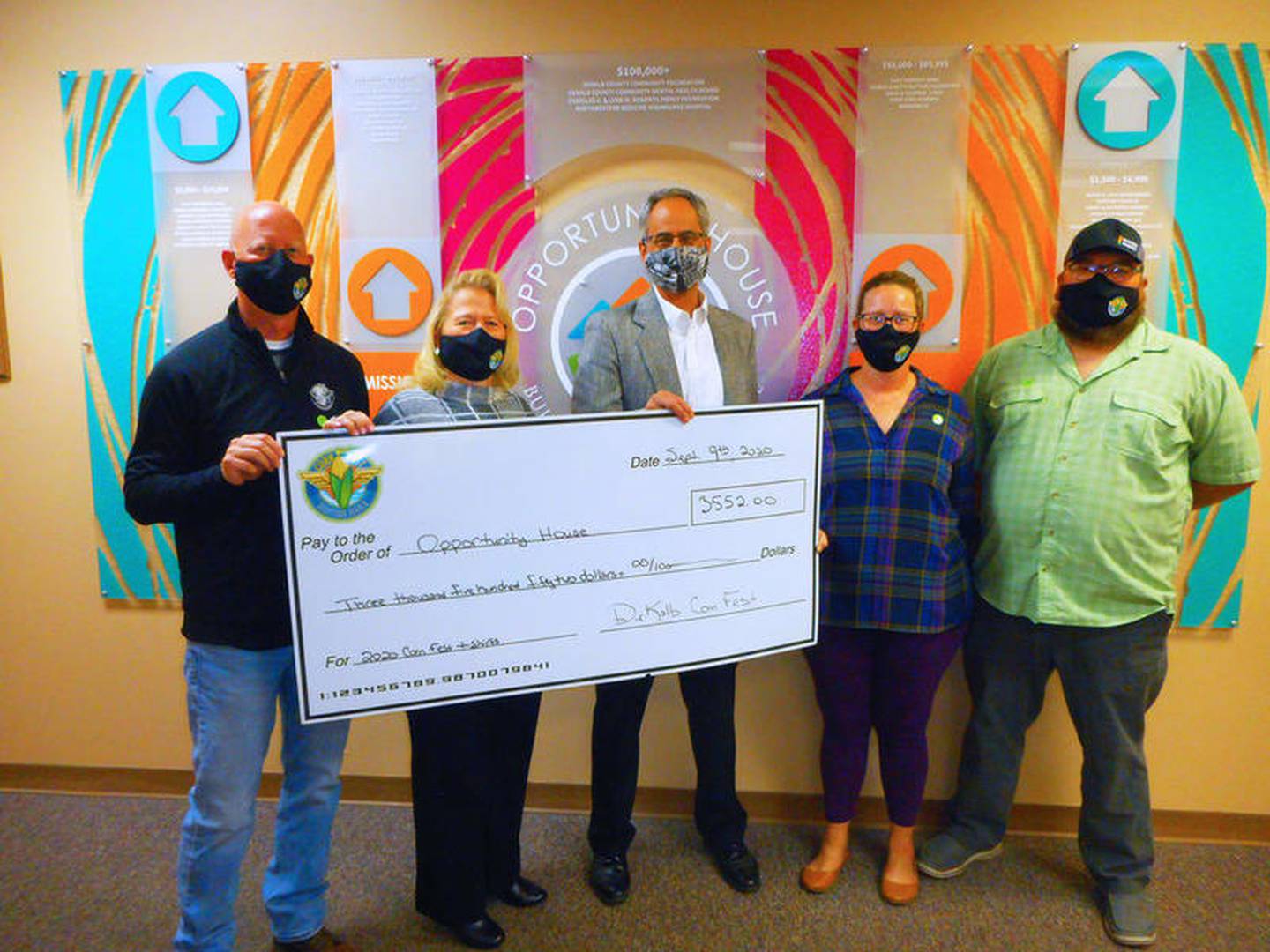 Sept. 9, 2020 file photo of Corn Fest Board members presenting check to Opportunity House – Pictured (from left) are Shawn Lowe, Lisa Angel, Bob Shipman of Opportunity House, Christi Coulter and Ben Coulter. (Provided by DeKalb Corn Fest)