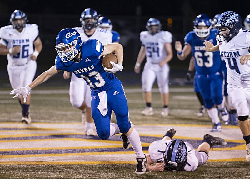 Newman’s Mac Hanrahan avoids a tackle against Bureau Valley Friday, Sept. 29, 2023 in Sterling.