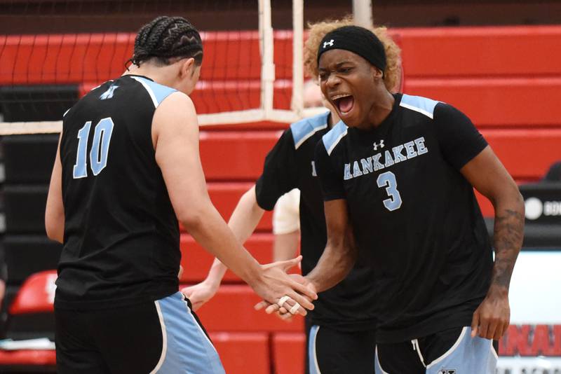 Kankakee's Jamon Barlow, right, and Aidan Lidell celebrate a point during a game at Bradley-Bourbonnais Thursday, April 9, 2026.