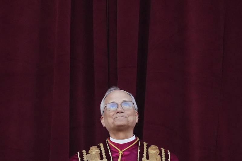 Newly elected Pope Leo XIV appears at the balcony of St. Peter's Basilica at the Vatican, Thursday, May 8, 2025. (AP Photo/Alessandra Tarantino)