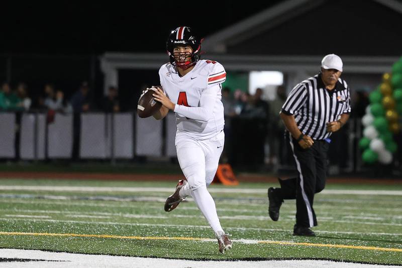 Lincoln-Way Central’s Drew Weedburn looks to pass against Providence on Friday, Sept. 6, 2024 in New Lenox.