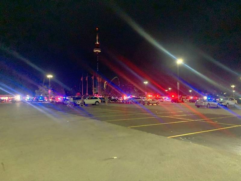 Police cars and ambulances converge outside Six Flags Great America after reports of gunfire just before the Gurnee park closed Sunday night. (Courtesy of Alicia Fabbre)