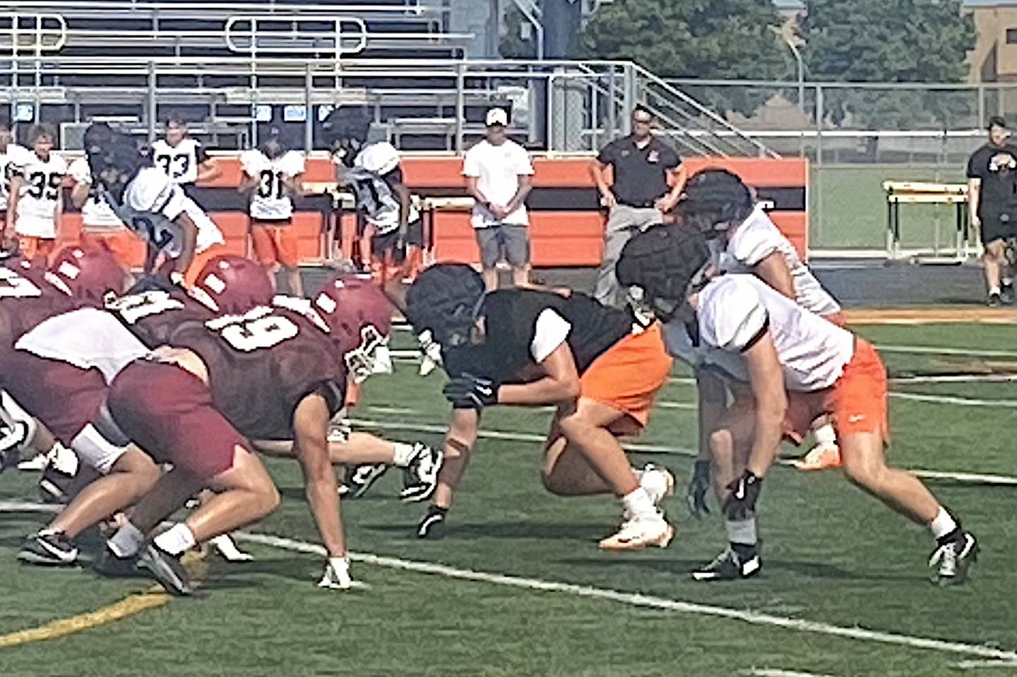 Minooka's Jackson Miranda (middle) will be a starter on both offense and defense for the Indians this fall.