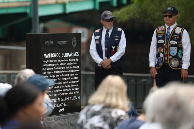 Several Navy veterans that served on submarines unveiled the new veterans memorial at a special Flag Day ceremony dedicating a memorial to remember the 28 World War II Submarines that traveled through Joliet on their way to the Pacific theater in Bicentennial Park on Wednesday, June 14, 2023 in Joliet.