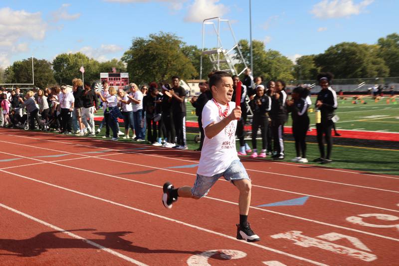 Kankakee's Andrik Ketcham sprints to the finish line to secure second place for the Kays in a relay race during the annual Boilermaker Games, hosted by the Best Buddies club on Wednesday, Oct. 8, 2025.