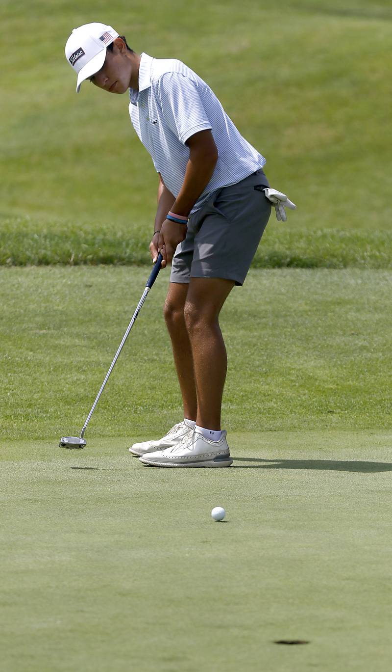 Max Sinha putts off the fourth green during the final round of McHenry County Junior Amateur Golf Tournament  on Tuesday, July 18, 2025, at Foxford Hills Golf Club in Cary.