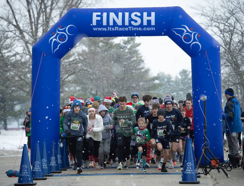 Runners in the 35th annual Jingle Bell Run start the race at Kankakee Community College on Sunday, December 7, 2025.