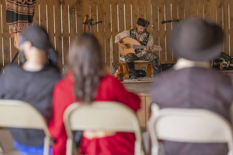 Nazario Chickpezio performs music for the audience at the Cedar Creek Renaissance Faire on Saturday, Sept. 28, 2024, at Cedar Creek Ranch.