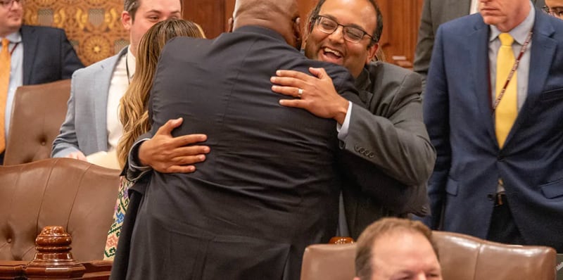 Sen. Ram Villivalam, D-Chicago, is congratulated by Sen. Elsie Sims, D-Chicago, after the Senate passed a plan on Saturday, May 31, 2025, to reform public transportation in the Chicago area.