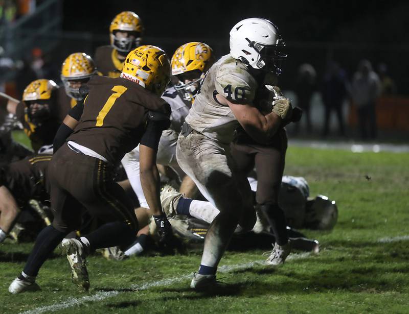 Cary-Grove's Logan Abrams runs for a touchdown against Jacobs during a Fox Valley Conference football game on Friday, Oct. 24, 2025, at Jacobs High School in Algonquin.