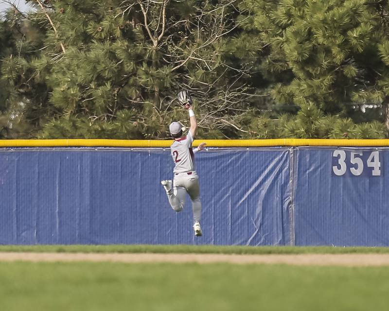 Plainfield North's Johnny Andretch (2) watches as a ball hit by Oswego East's Jacsen Tucker (17) clears the fence during baseball game between Plainfield North at Oswego East, Monday, April 28, 2025 in Oswego.