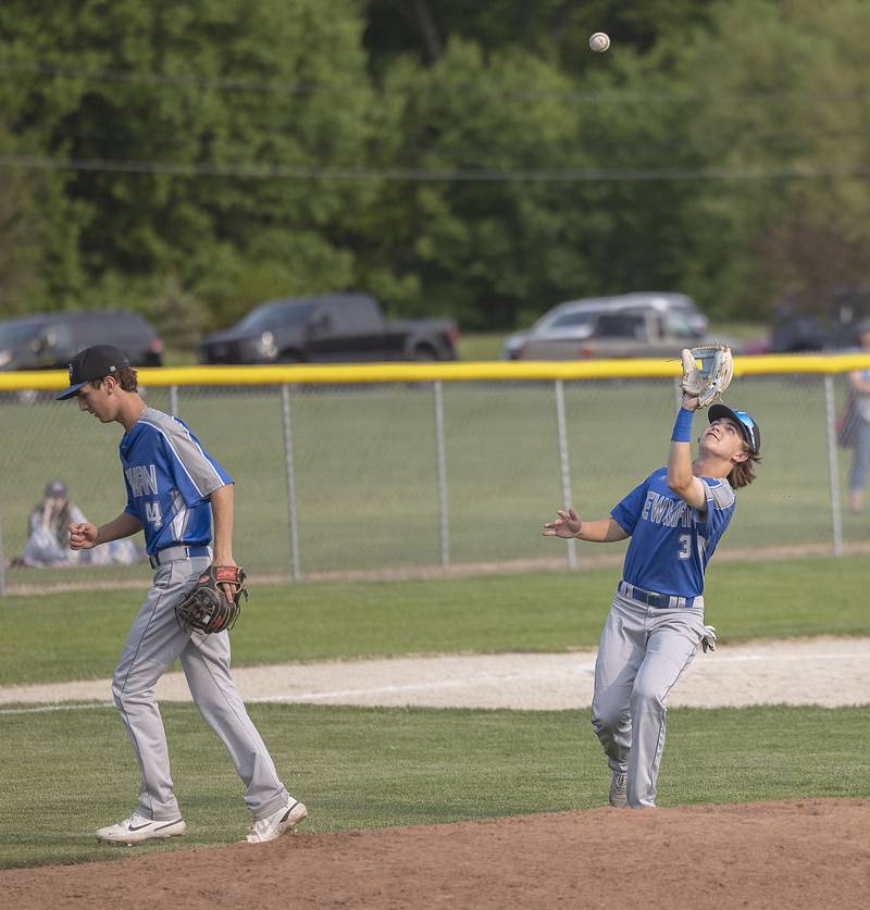 Newman’s Garet Wolfe camps under a pop fly against Amboy Thursday, May 18, 2023.