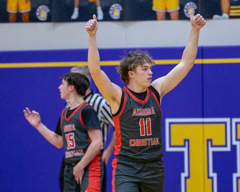 Zach Zappia (11) of Aurora Christain reacts with thumbs in air signaling jump-ball during the Class 2A Boys Sectional Basketball tournament game on Wednesday, March 4, 2026 at Mendota High School.