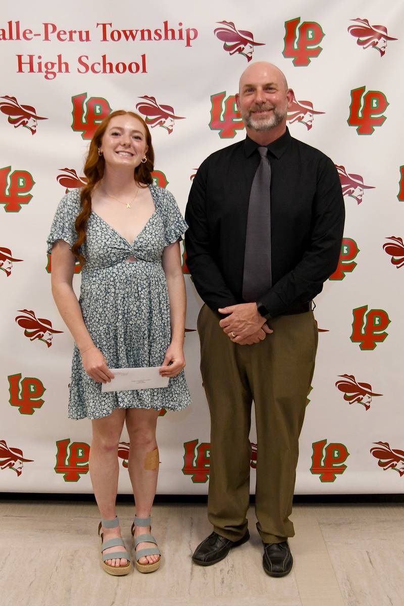 Addison Duttlinger received the $500 Elizabeth Boyle/Richard Henneberry Scholarship for students who plan to degree in nursing, biology, speech pathology/audiology or psychology. The scholarship was presented by L-P social science division chair Troy Woods.