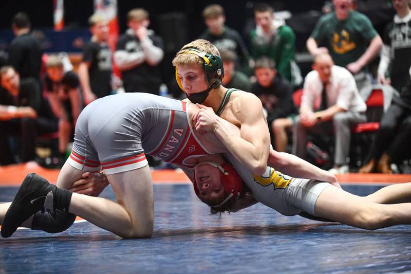 Luke Munsterman of Coal City wrestles Elijah Mabry of Vandalia in the 132-pound match during the IHSA Dual Team State Finals in Bloomington on Saturday, March 1.