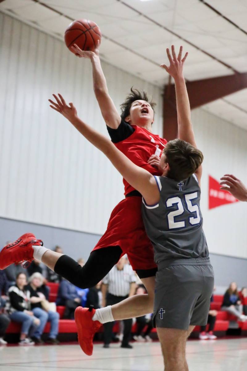 Princeton Christian Academy's Daniel Barnes soars for a shot against Fulton Unity Christian Thursday night at PCA's Howard Hoffman Gym. PCA won 39-35.