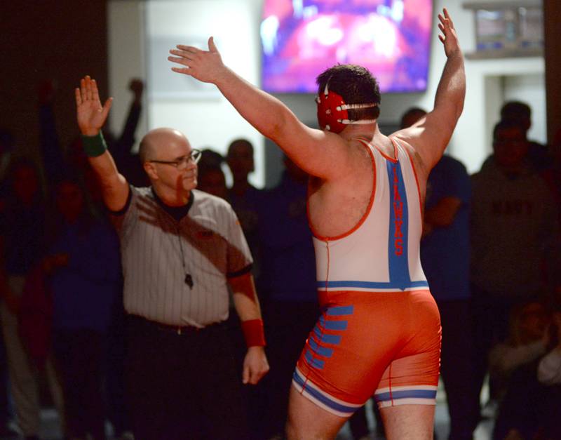 Oregon's Briggs Sellers reacts after winning his match against Newman's Matthew Murray at the 1A team sectional held Tuesday, Feb. 25, 2025 in the Blackhawk Center in Oregon.
