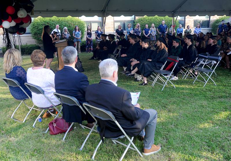 Julie Duncan, administrator of Haber Oaks Campus, speaks to the graduates Thursday, May 12, 2022, during the Haber Oaks Campus graduation in the courtyard of Crystal Lake South High School.