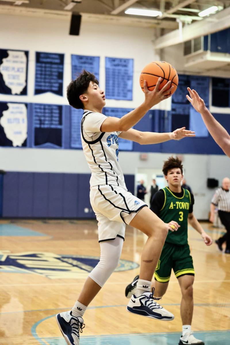 Bureau Valley's Carter Chhim takes in a layup in Friday's against Abingdon-Avon at the Storm Cellar. A-Town won 47-45.