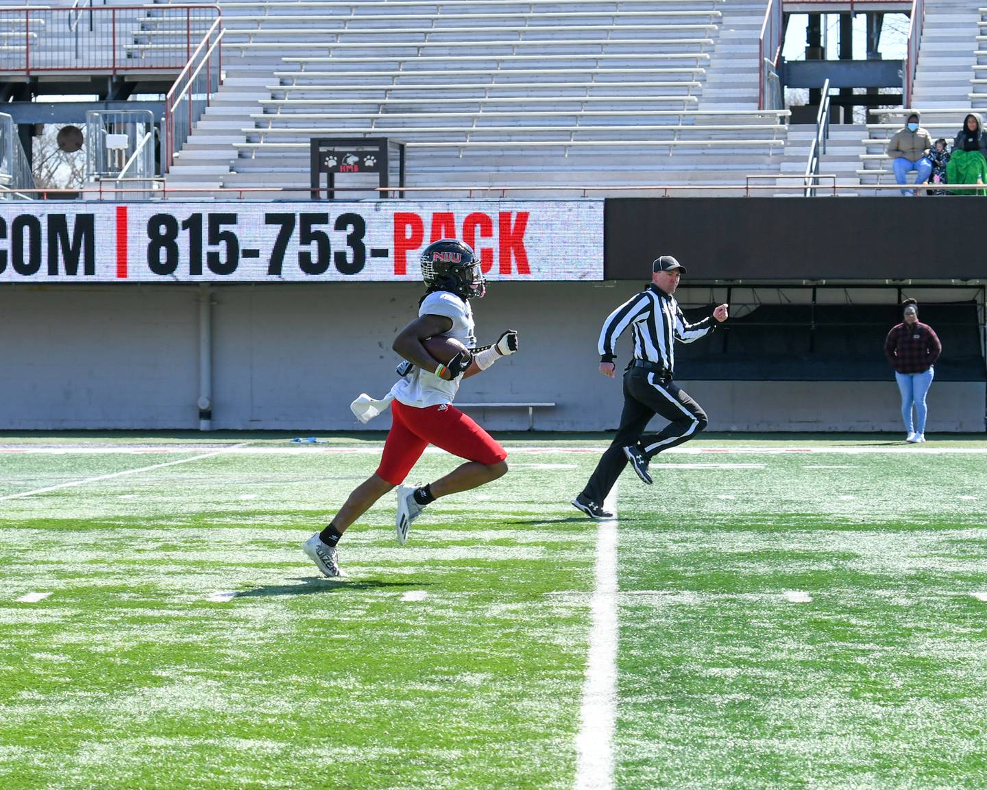 Northern Illinois University wide receiver Billy Dozier (10) runs. the ball in for a touchdown during the spring scrimmage at Huskie Stadium in DeKalb held on Saturday April 16th.