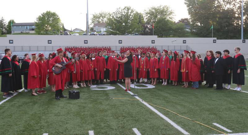 La Salle-Peru Township High School choir and graduates sing "Good Riddance" (Time of Your Life) during the L-P Class of 2026 commencement ceremony on Thursday, May 14, 2026 at Howard Fellows Stadium.