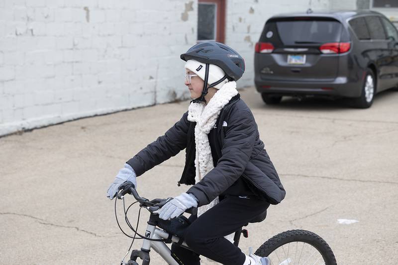 Teagan Moore, 13, takes off from the former Green River Cyclery on Wednesday, Jan. 1, 2025, in Dixon.