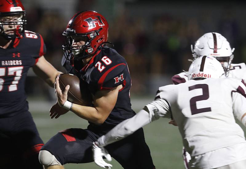Huntley's Chase Hojnacki cuts away from Prairie Ridge's Logan Thennes during a Fox Valley Conference football game on Friday, Oct. 3, 2025, at Huntley High School.