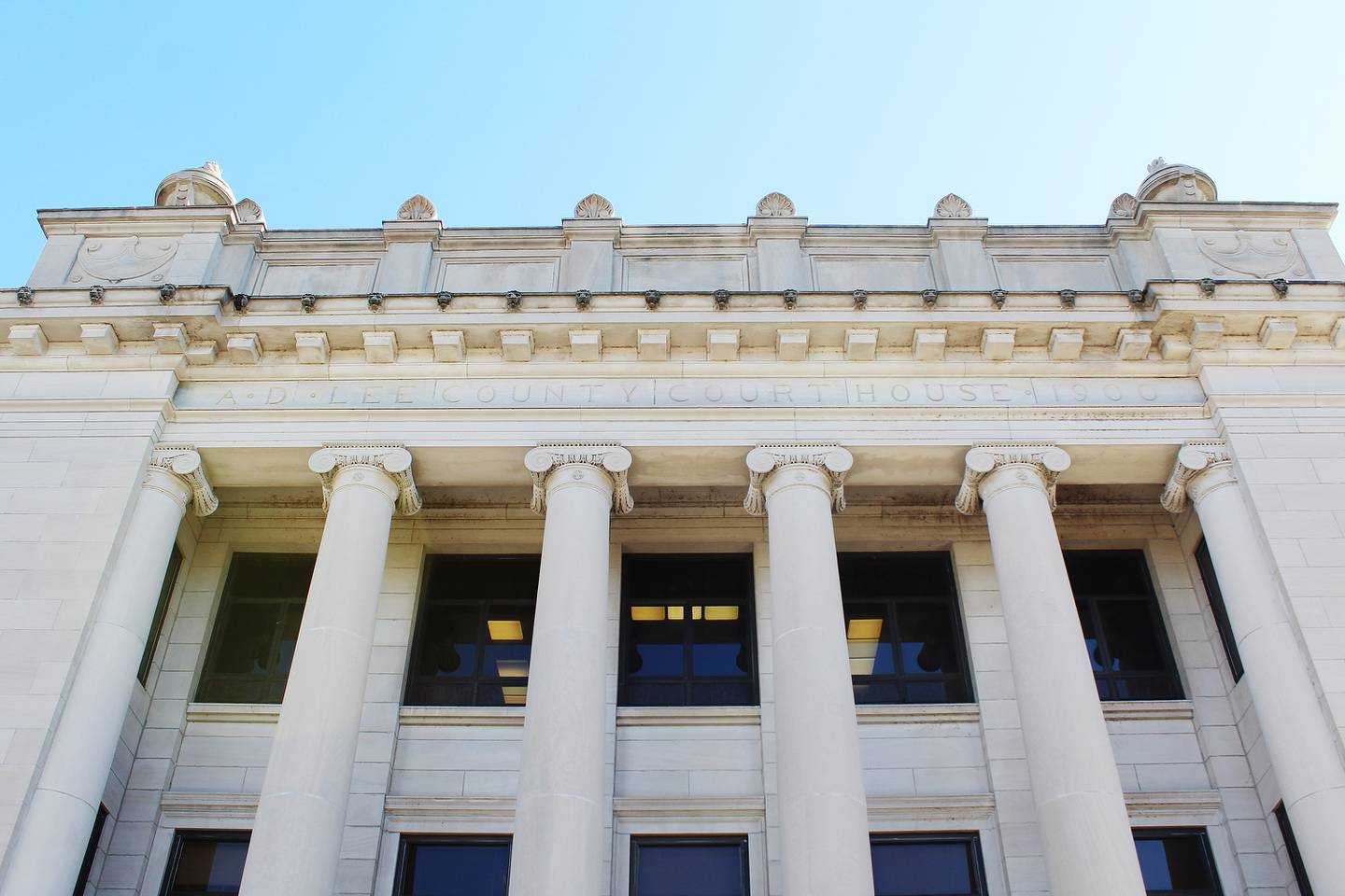 The Old Lee County Courthouse, which was the county's primary government building from 1901 to 1984, began construction 125 years ago, in 1900. The year "1900" appears at the top.