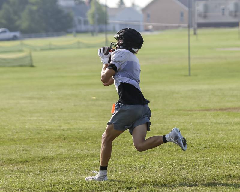 Nick Michalek runs routes out of the backfield during Sandwich football practice Tuesday, July 22, 2025 in Sandwich.
