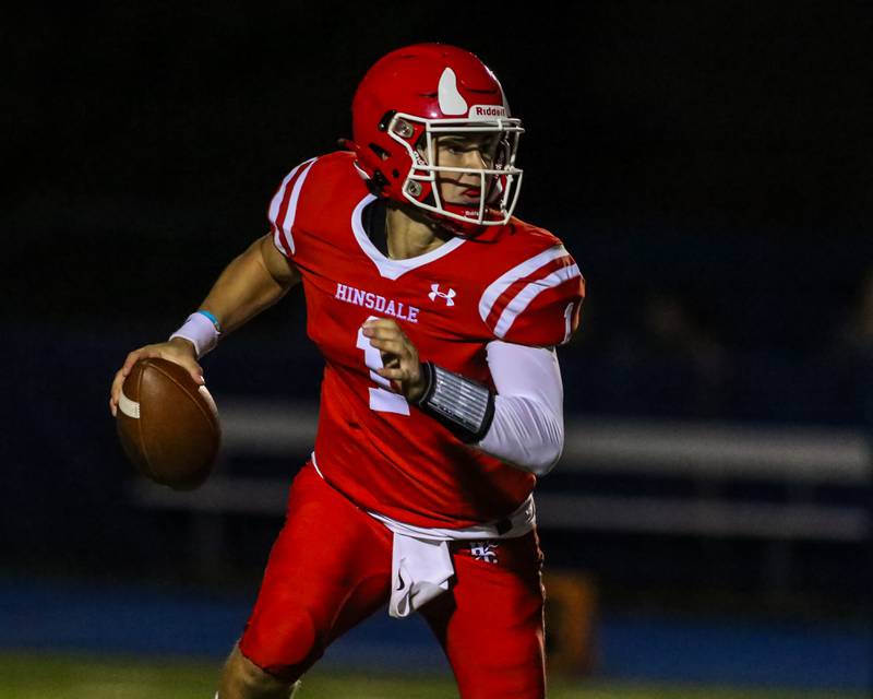 Hinsdale Central's Benjamin Monahan (1) scrambles during football game between Hinsdale Central at Lyons.  Sept 8, 2023.
