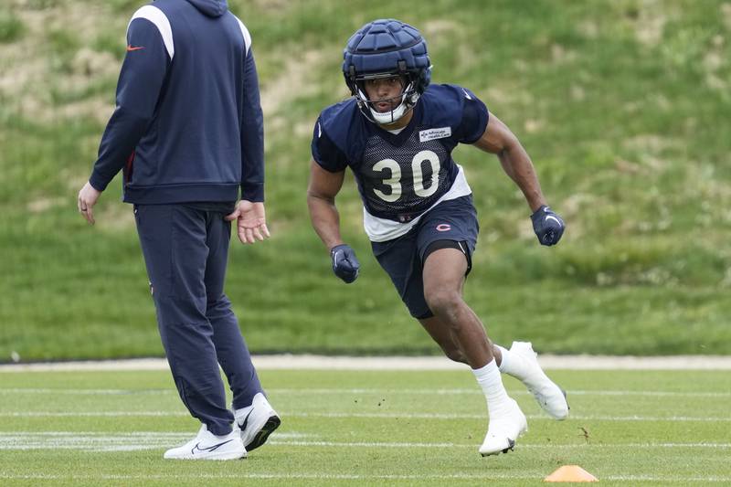 Chicago Bears running back Roschon Johnson runs on the field during the team's rookie minicamp at Halas Hall in Lake Forest, Ill., Saturday, May 6, 2023.