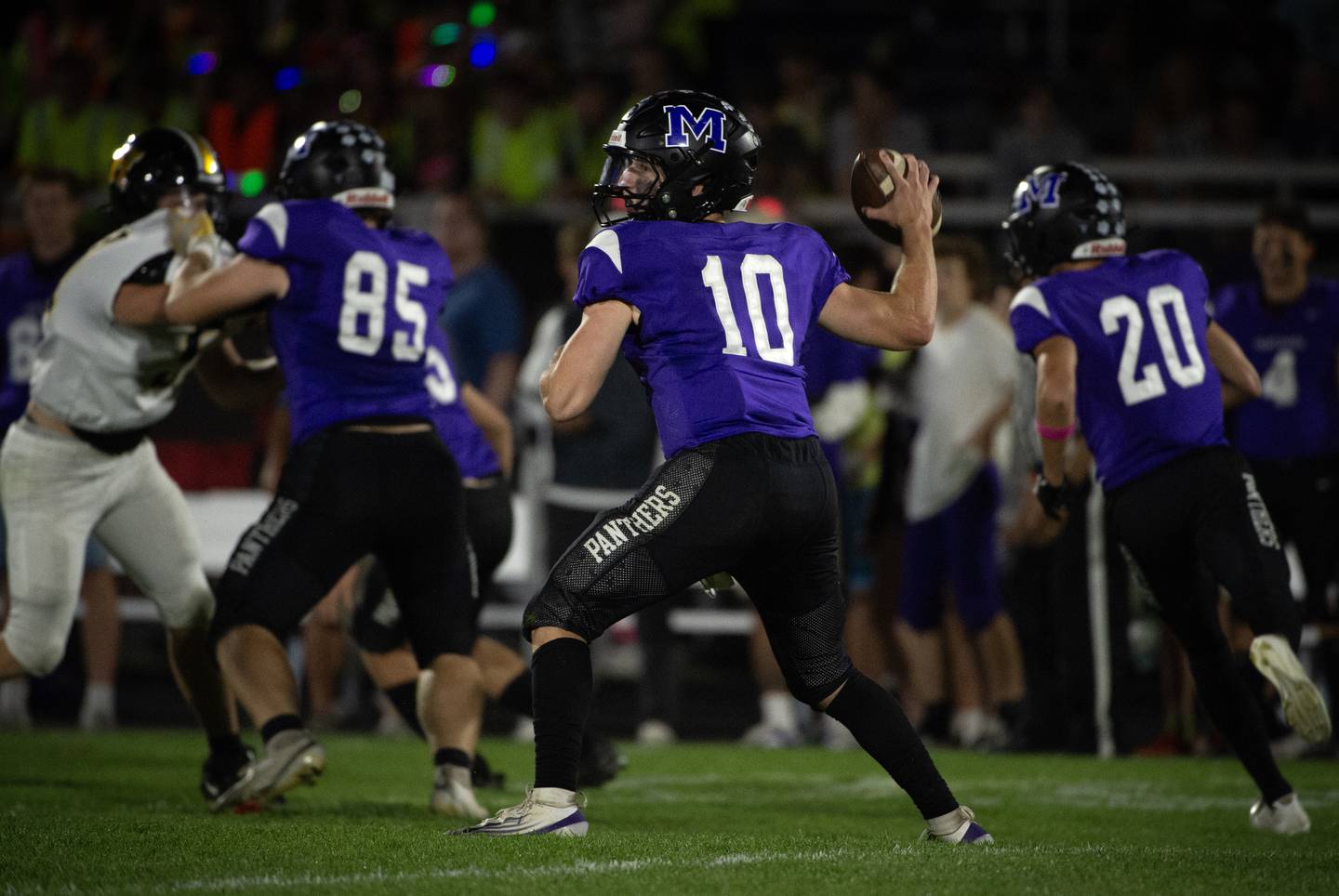 Manteno's Connor Harrod steps back to pass in a game against Herscher on Friday, September 12, 2025.