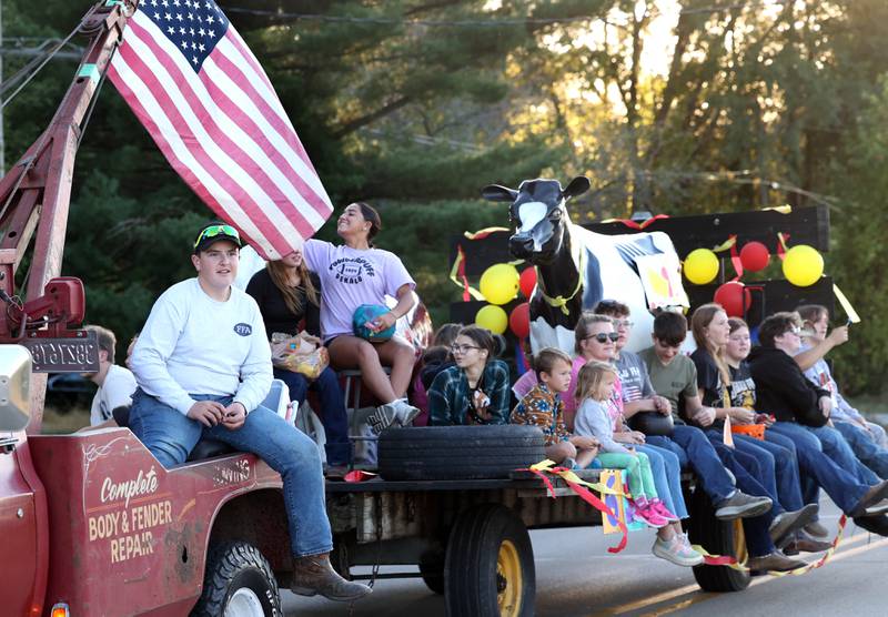 The DeKalb High School Future Farmers of America float makes its way down West Dresser Road Wednesday, Oct. 2, 2024, during the DeKalb homecoming parade.