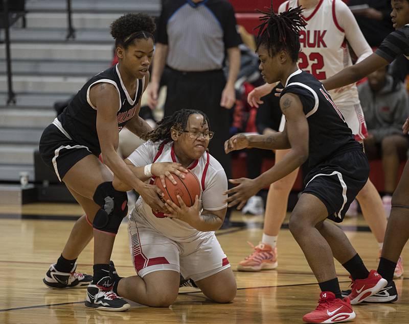 SVCC’s Mya West protects the ball against Malcom X’s Nia Allen (left) and Diana Tolbert Monday, Feb. 23, 2026.
