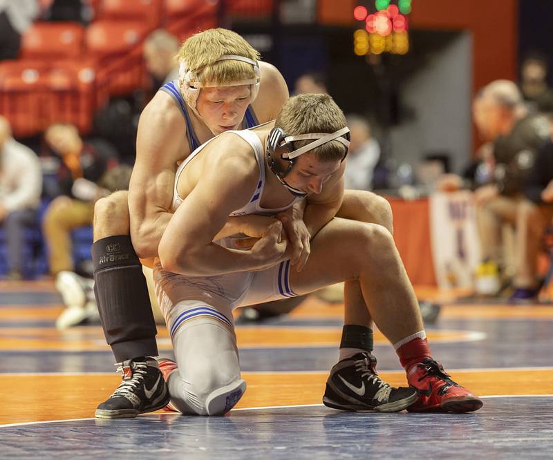 Sterling Newman Central’s Daniel Kelly control Hoopston’s Ayden Larkin in the 157 pound 1A fifth place match Saturday, Feb. 17, 2024 at the IHSA state wrestling finals at the State Farm Center in Champaign.