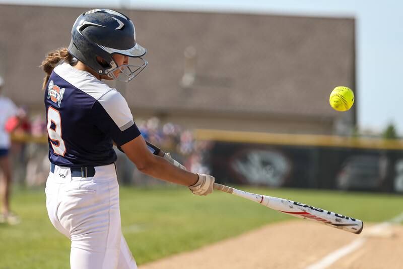Oswego's Maddie Hernandez (9) connects on a pitch during Class 4A Plainfield North Sectional final softball game between Wheaton North at Oswego. May 31th, 2024.