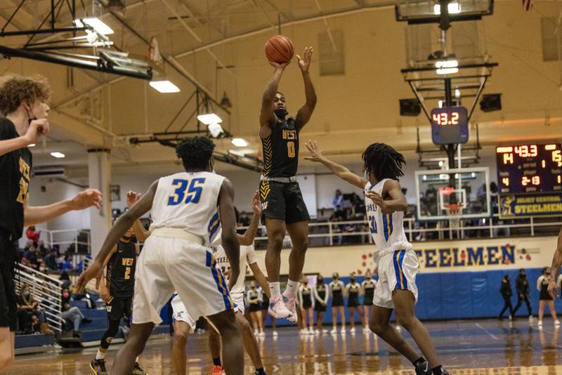 Joliet West's Arquis Yancey puts up a shot against Joliet Central. Saturday, Feb. 12, 2022, in Joliet.