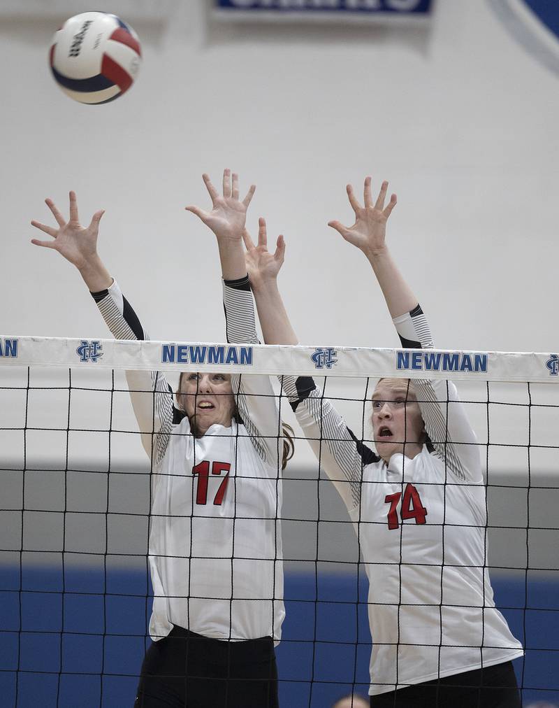 Erie-Prophetstown’s Kayler Pritchard (left) and Eden Jensen go up for a block against Newman Tuesday, Oct. 14, 2025.