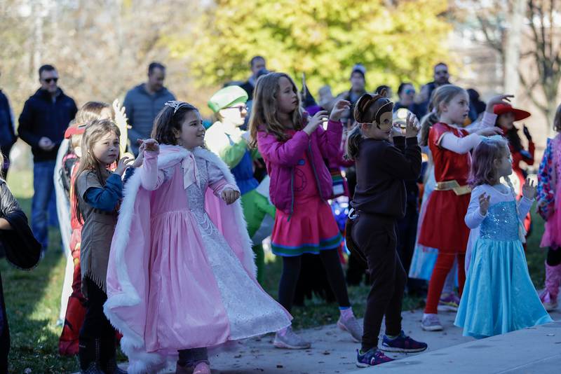Kids dance during the Monster Mash Dance Party at Fishel Park in Downers Grove, Ill. on Saturday, October 29, 2022.