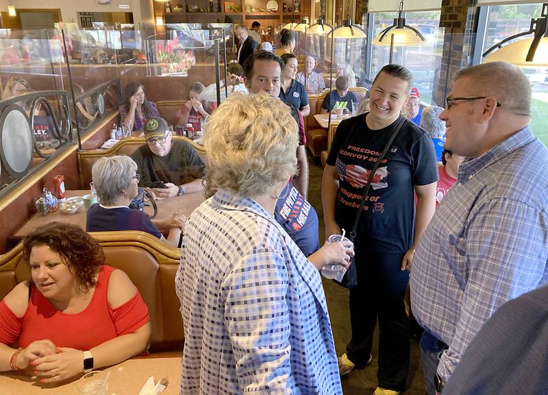 Republican candidate for governor Darren Bailey talks with supporters as he campaigns Wednesday, Sept. 21, 2022, at the Around the Clock Restaurant, 5011 Northwest Highway, in Crystal Lake, during a nine-city bus tour, with Lt. Governor candidate Stephanie Trussell.