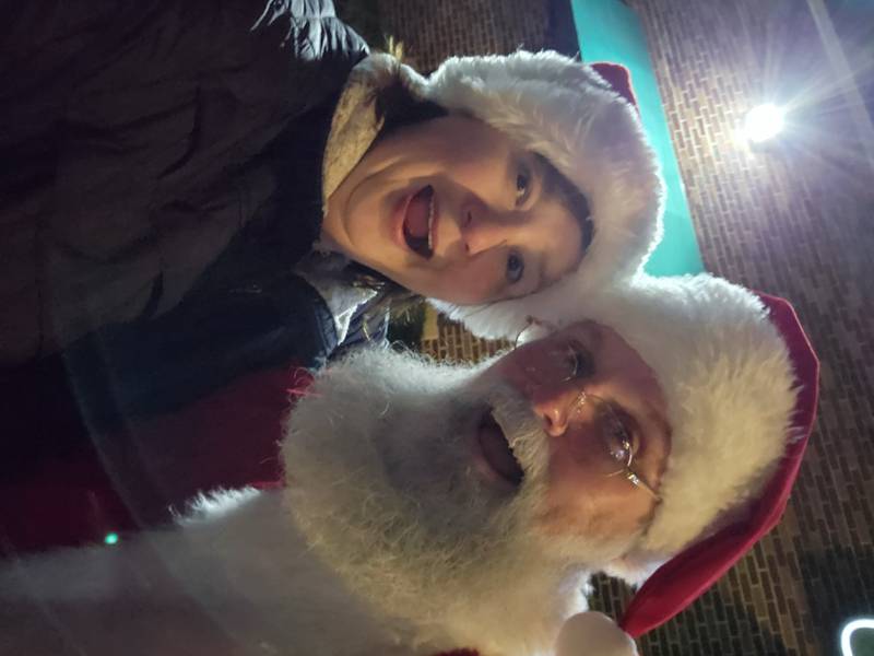 Genoa Area Chamber of Commerce executive director Krissy Johnson poses with Santa at the chamber's annual Celebrate the Season and Jingle Bell parade. The event returns Dec. 5, 2025.